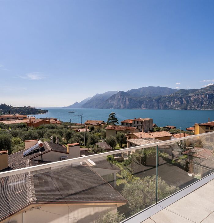 Junior Suite con balcone e vista lago laterale | Luce e prospettiva