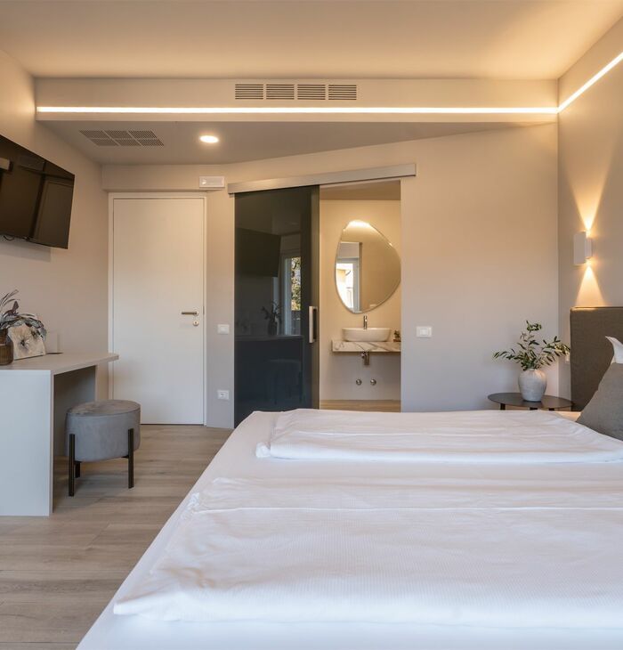 Suite con balcone | La tua suite sul lago